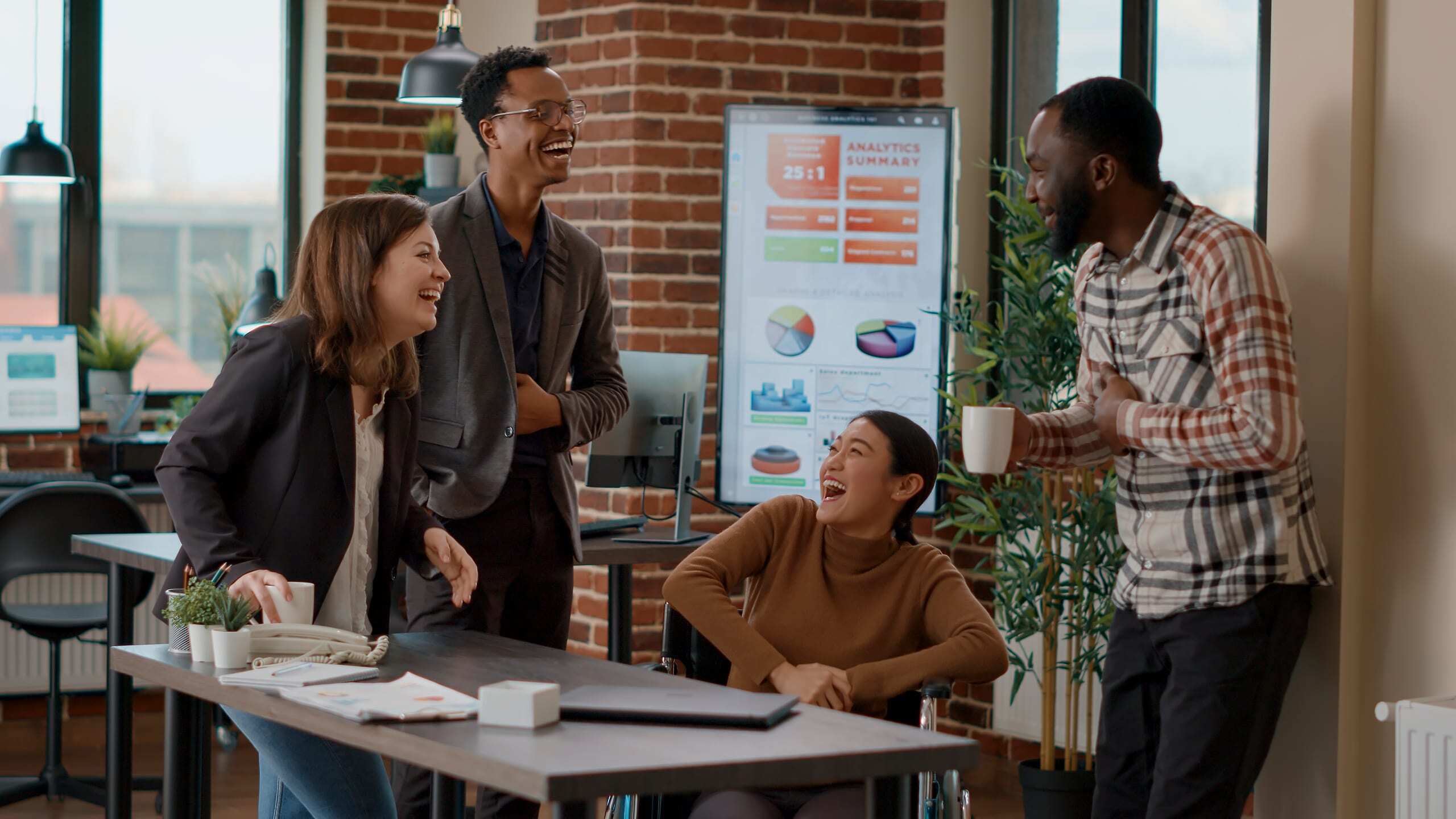 multiethnic-team-employees-meeting-break-have-fun-discussing-about-business-collaboration-happy-people-laughing-planning-marketing-project-office-handheld-shot